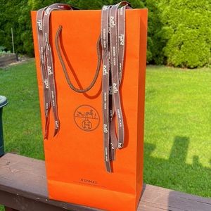 Hermēs shopping bag and 3 Hermēs ribbons
